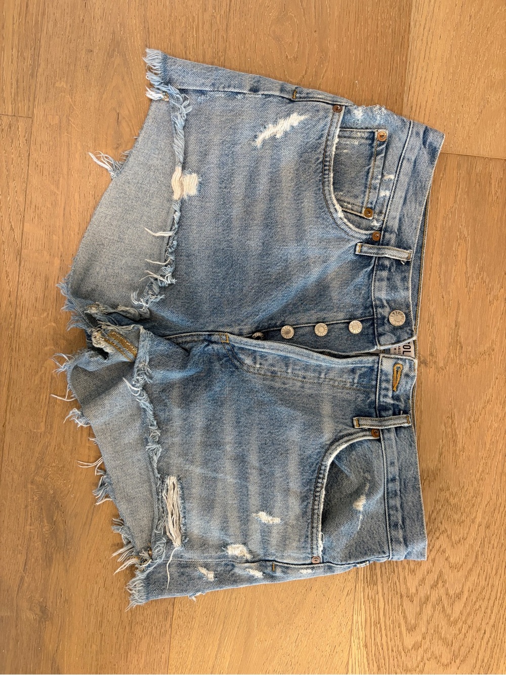 Agolde Distressed Light Blue Denim Shorts - Button Front